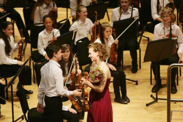 Soloist Jessica Coleman receives her bouquet after her sparkling performance 