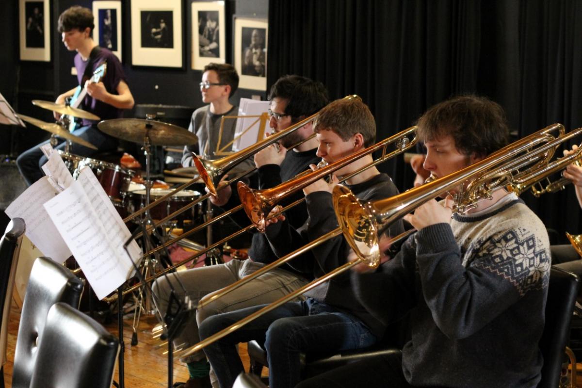 NYOS Jazz Orchestra trombones rehearsing ahead of its Double Big Band performance at Hallé St Peter's, Manchester