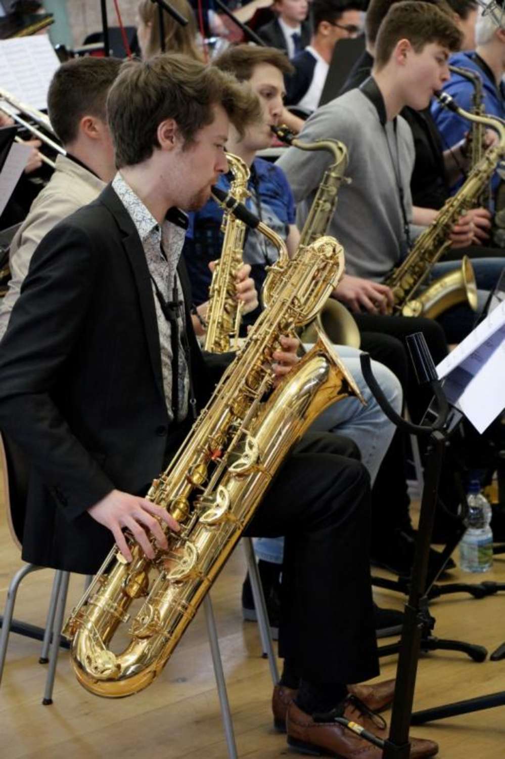 NYOS Jazz Orchestra baritone sax rehearsing ahead of the Double Big Band performance at HallÃ© St Peter's, Manchester