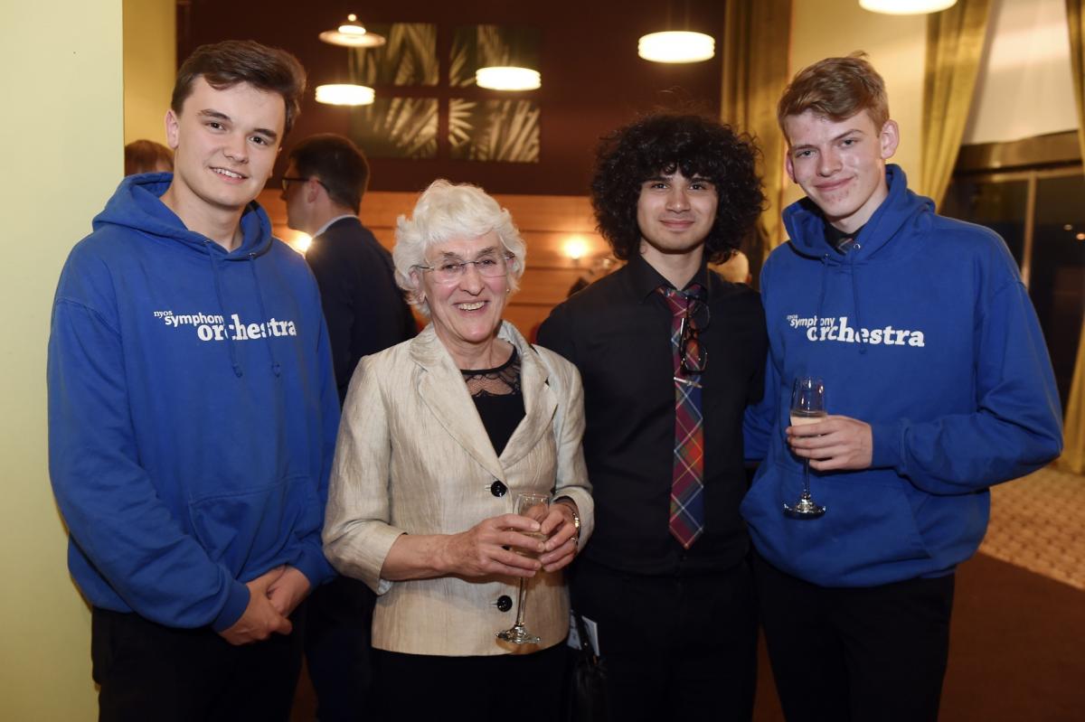 Left to right: William Fielding (Cello), Marjorie Rycroft (Chairman of the NYOS Board), Nicholas Ross (First Violin) and Matthew Terras (Cello) at the post concert reception, Glasgow Royal Concert Hall, 5 August 2017