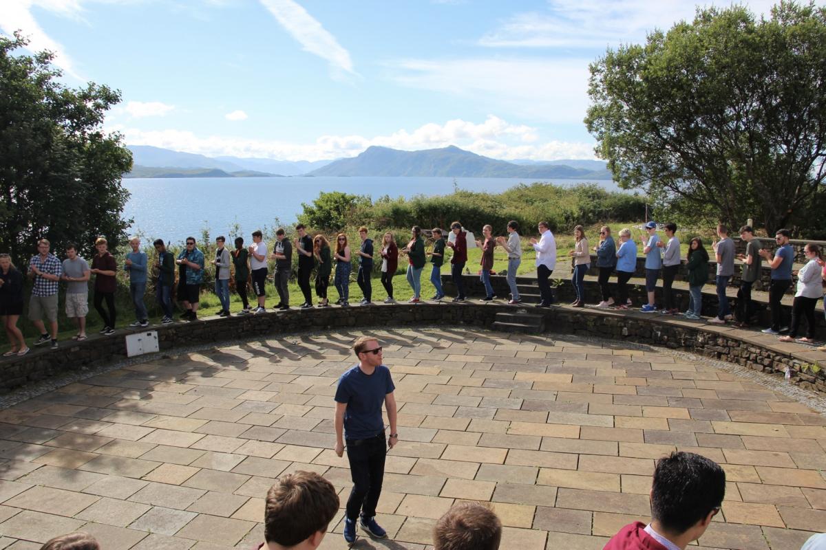Breathing and rhythm warm up excersises around the stone ampitheatre at NYOS Jazz Summer School, Sabhal Mór Ostaig, Isle of Skye