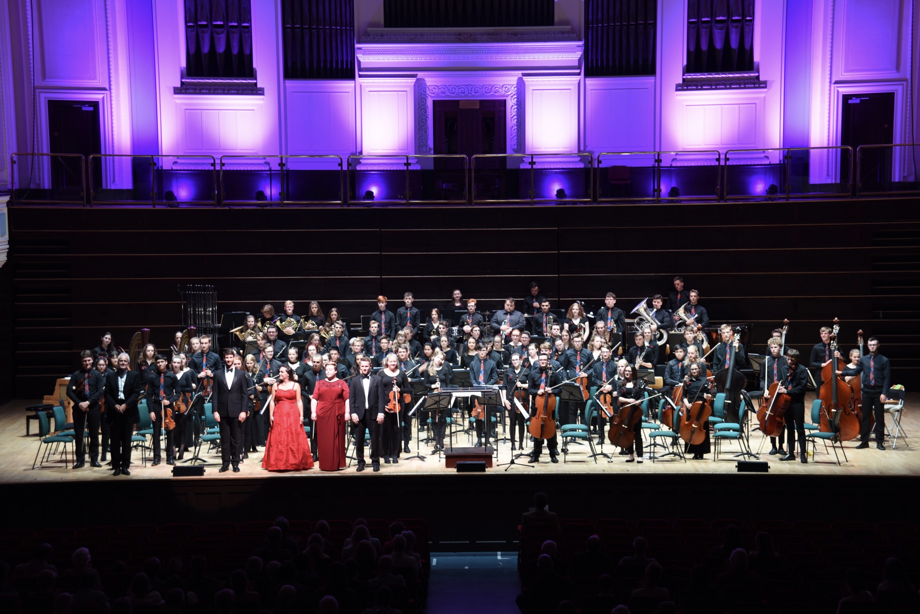 Orchestra bow with conductor Paul Daniel and singers Rebecca Afowny-Jones, David Lynn, Emma Mockett and Mark Nathan at Dundee\'s Caird Hall, August 2018