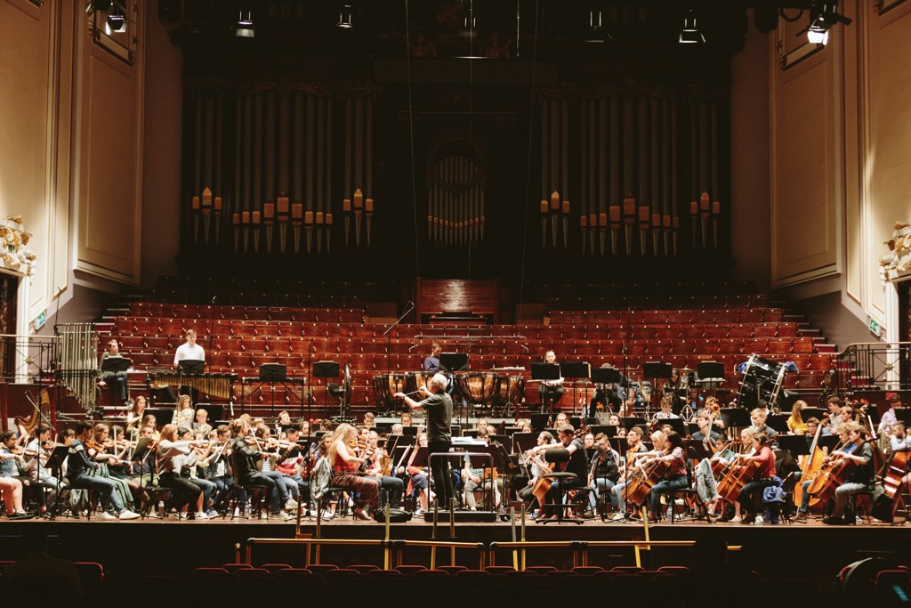 Conductor Paul Daniel putting the orchestra through its paces during final rehearsal before performing at the Edinburgh International Festival, August 2018. Photograph by Ryan Buchanan.