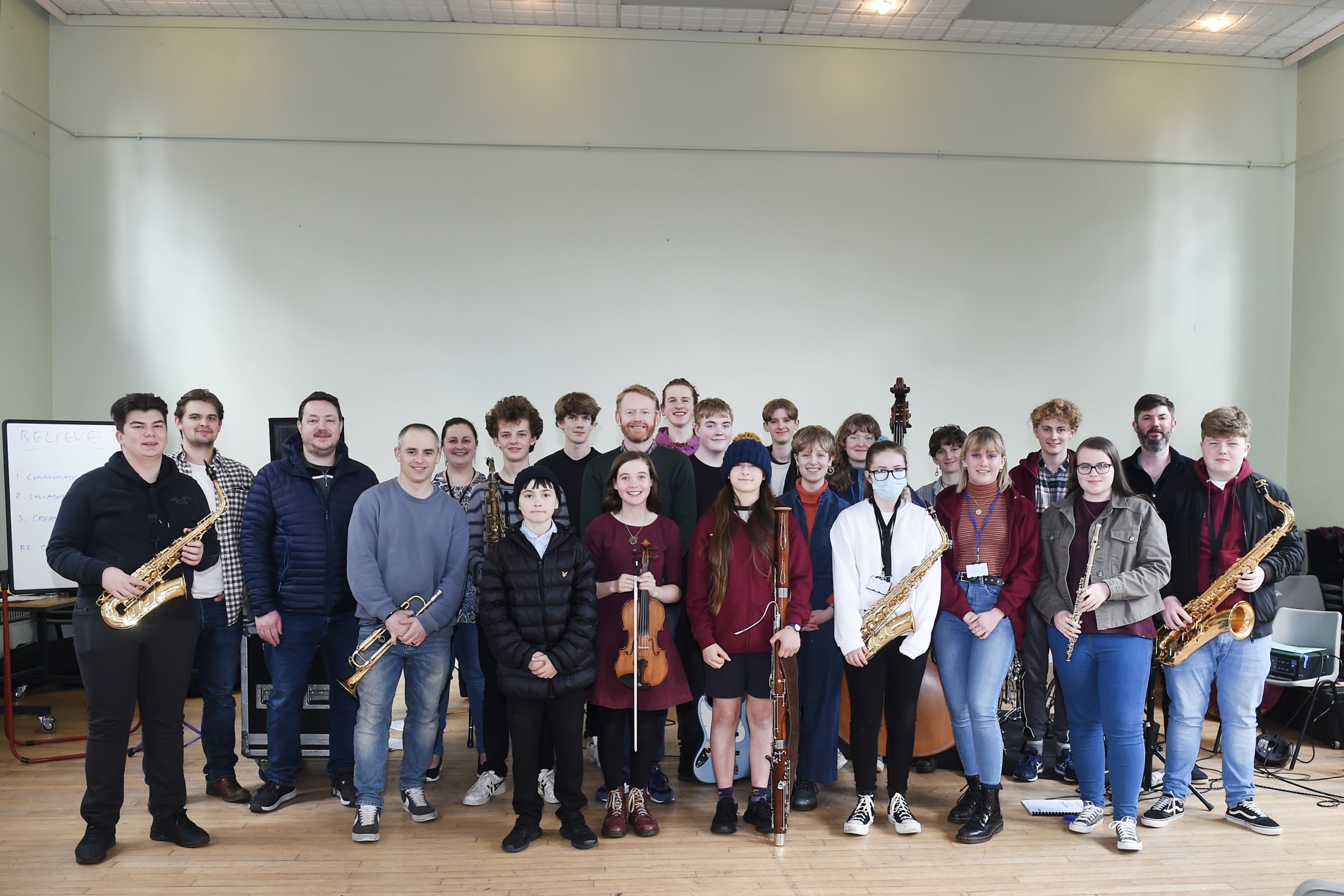 Jazz musicians and tutors posing for a group photograph