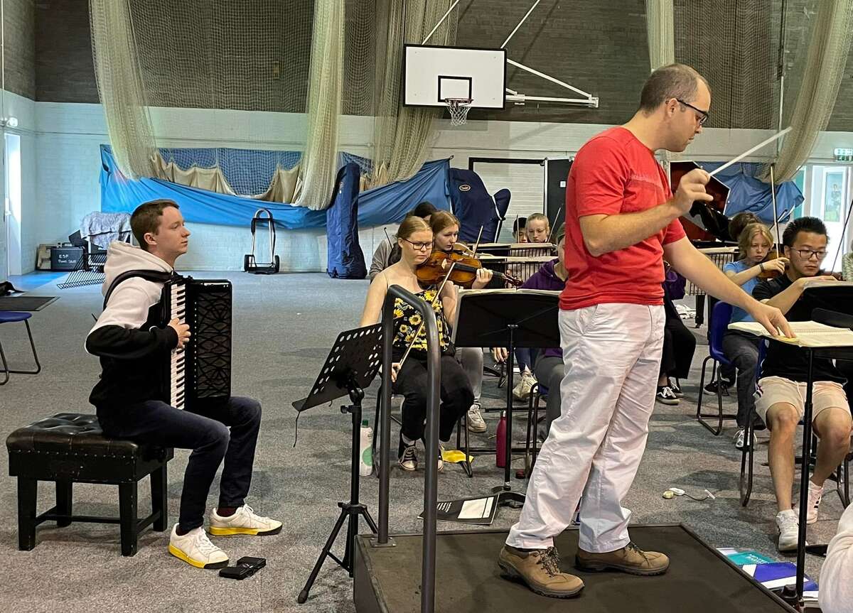 Soloist Ryan Corbett Rehearsing With Senior Orchestra, 2022